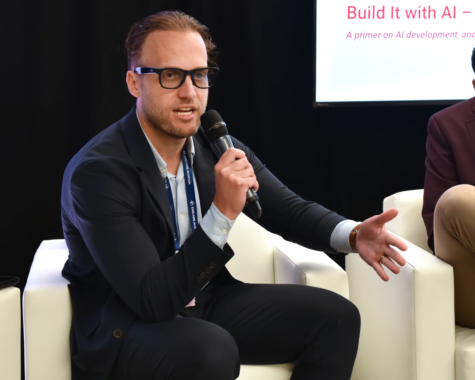 Ben Thomas of ForIT speaking on the CBAA 2026 Innovation Stage in Calgary